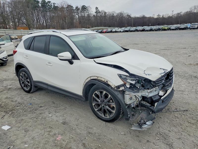 Photo 4 from auction – 2016 MAZDA CX-5 with VIN JM3KE2DYXG0864416