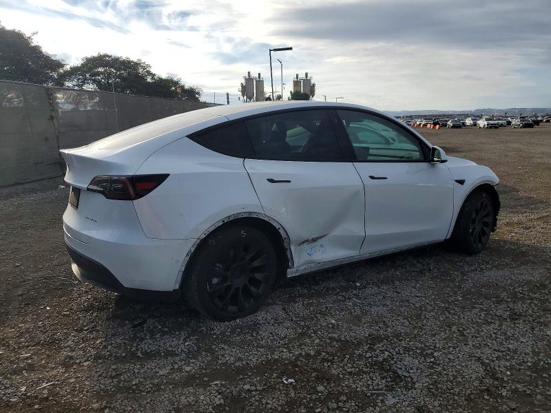 Photo 3 from auction – 2021 TESLA MODEL Y with VIN 5YJYGAEE0MF273200
