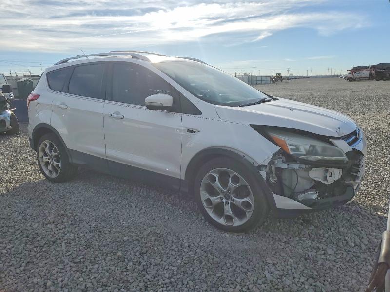 Photo 4 from auction – 2014 FORD ESCAPE TIT with VIN 1FMCU9J99EUA28197