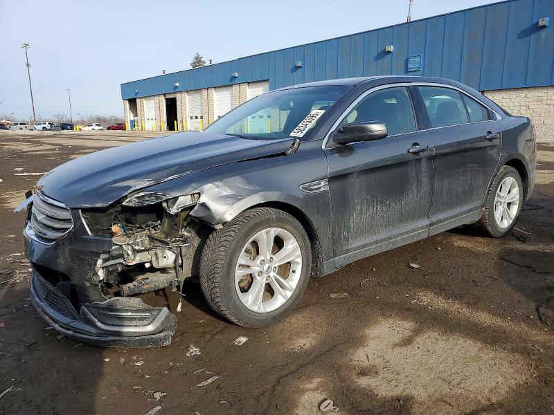 FORD TAURUS SEL 2016 with VIN 1FAHP2E8XGG153601 - Photo from auction