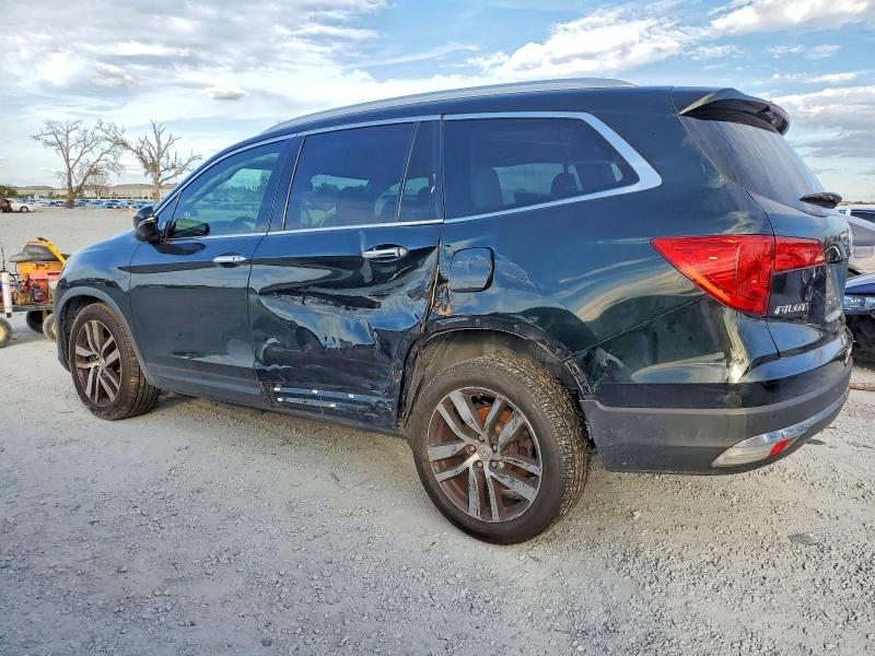 Photo 2 from auction – 2017 HONDA PILOT with VIN 5FNYF5H95HB002809