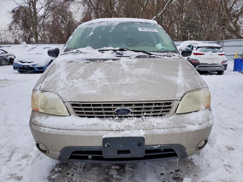 Photo 5 from auction – 2003 FORD WINDSTAR L with VIN 2FMZA55453BB72438