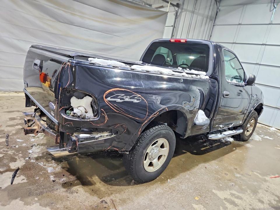 Photo 3 from auction – 2004 FORD F-150 HERITAGE with VIN 2FTRF08204CA33736