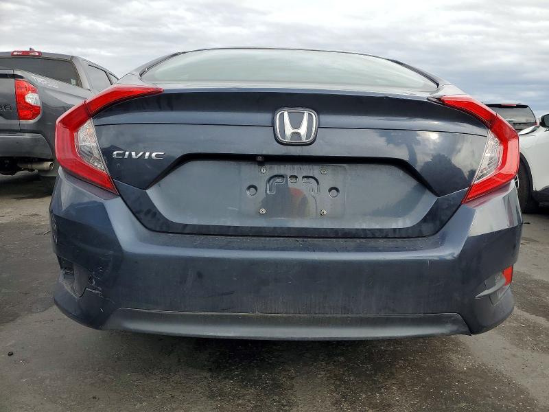Photo 6 from auction – 2018 HONDA CIVIC with VIN 19XFC2F58JE200374