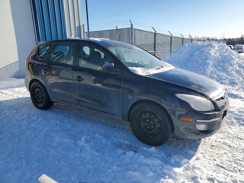 Photo 4 from auction – 2012 HYUNDAI ELANTRA TO with VIN KMHDC8AEXCU145136