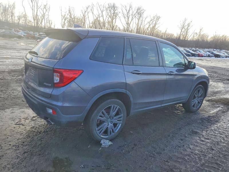 Photo 3 from auction – 2021 HONDA PASSPORT E with VIN 5FNYF8H57MB013917