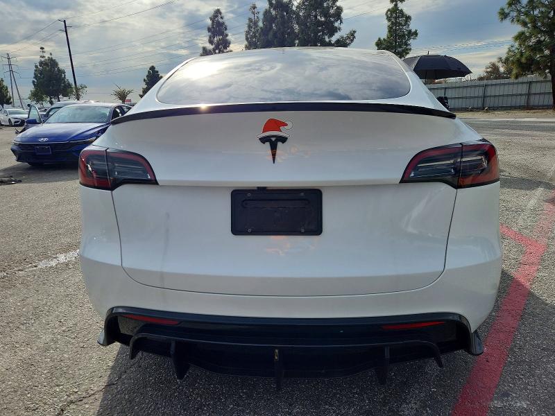 Photo 6 from auction – 2023 TESLA MODEL Y with VIN 7SAYGDEDXPF962628