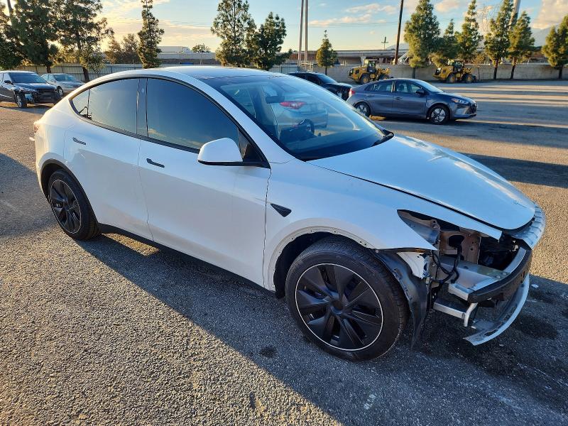 Photo 4 from auction – 2023 TESLA MODEL Y with VIN 7SAYGAEE5PF713130