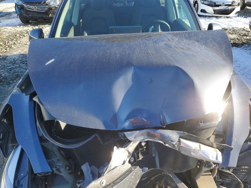 Photo 12 from auction – 2023 TESLA MODEL Y with VIN 7SAYGDEE0PF696335