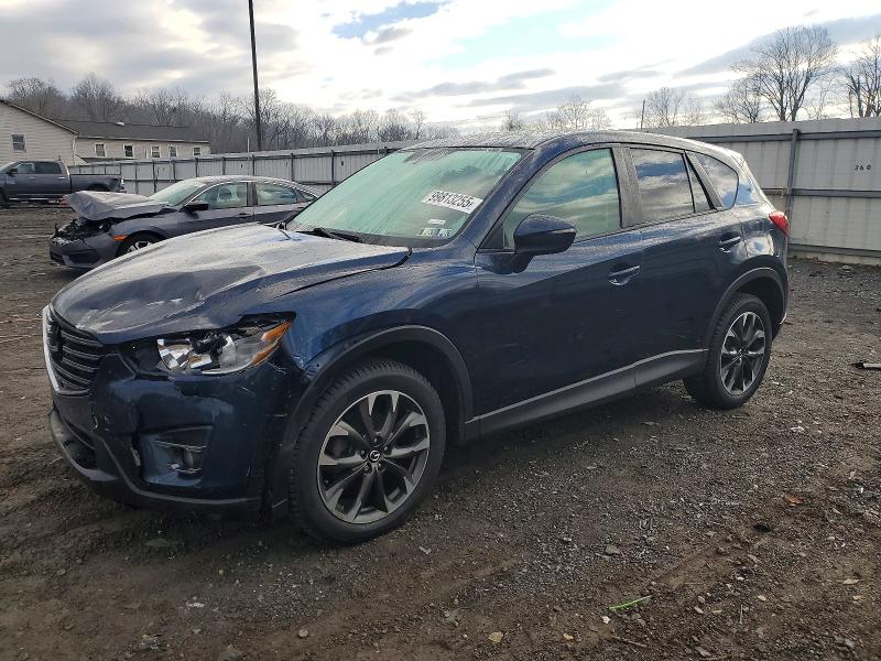 MAZDA CX-5 GT 2016 with VIN JM3KE4DY1G0879205 - Photo from auction