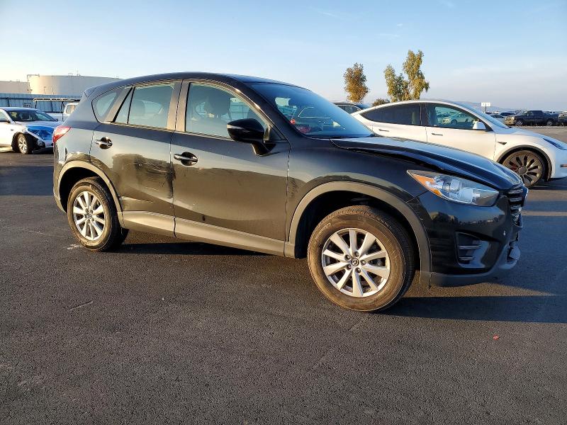 Photo 4 from auction – 2016 MAZDA CX-5 SPORT with VIN JM3KE4BY4G0680975