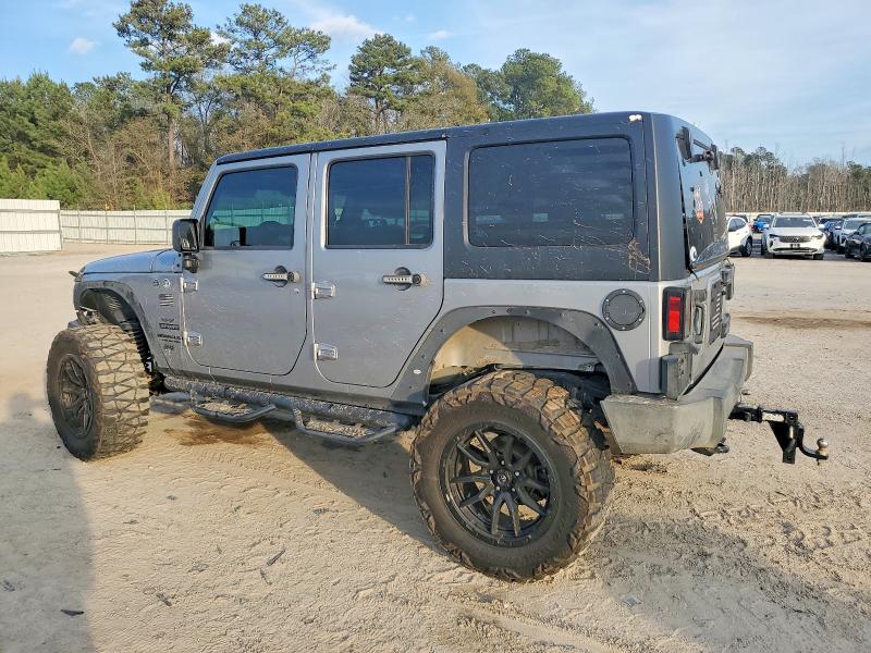 Photo 2 from auction – 2014 JEEP WRANGLER U with VIN 1C4BJWDG3EL134474