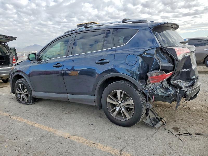 Photo 2 from auction – 2018 TOYOTA RAV4 with VIN JTMWFREV4JJ742995