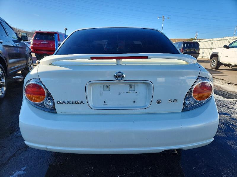 Photo 6 from auction – 2002 NISSAN MAXIMA GLE with VIN JN1DA31D92T451501