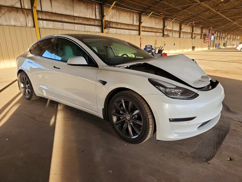 Photo 4 from auction – 2021 TESLA MODEL 3 with VIN 5YJ3E1EB3MF855152