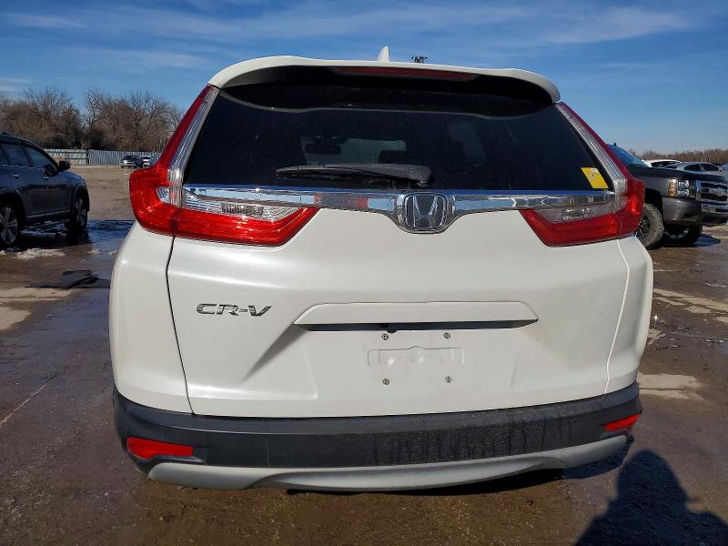 Photo 6 from auction – 2019 HONDA CR-V with VIN 7FARW1H81KE025018