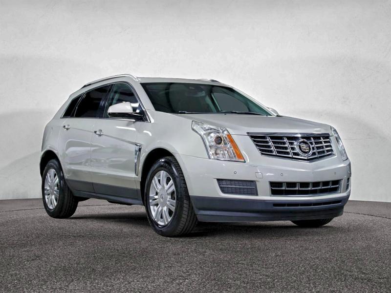CADILLAC SRX LUXURY 2014 with VIN 3GYFNBE36ES597952 - Photo from auction