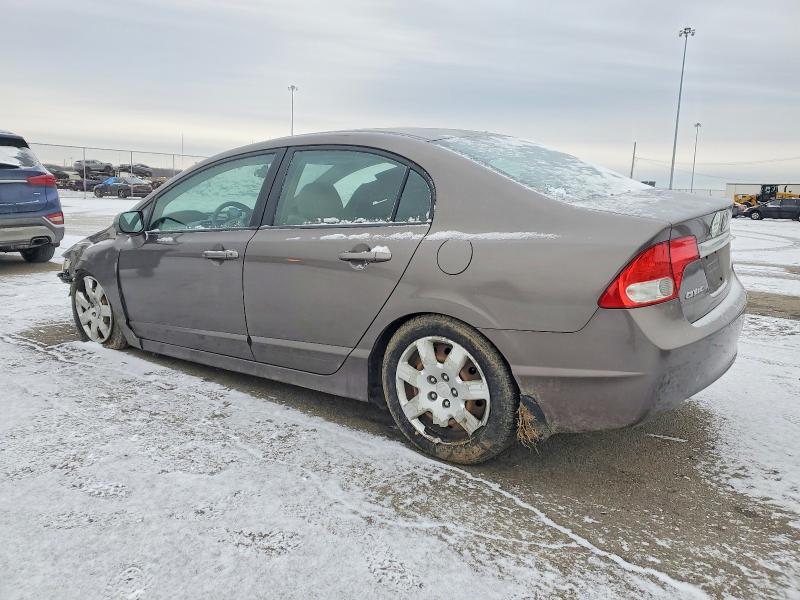 Photo 2 from auction – 2010 HONDA CIVIC LX with VIN 2HGFA1F59AH556726
