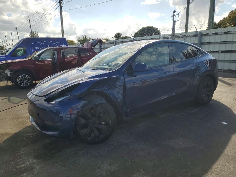 TESLA MODEL Y 2024 with VIN 7SAYGDED0RF131870 - Photo from auction