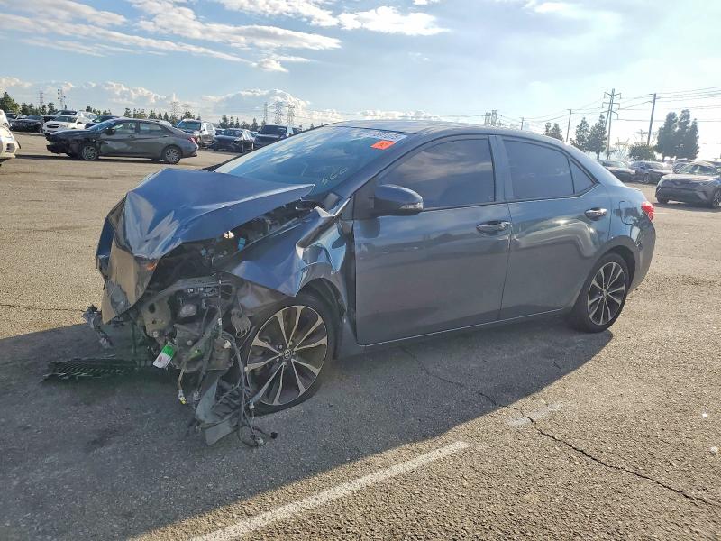 TOYOTA COROLLA L 2017 with VIN 5YFBURHEXHP647671 - Photo from auction