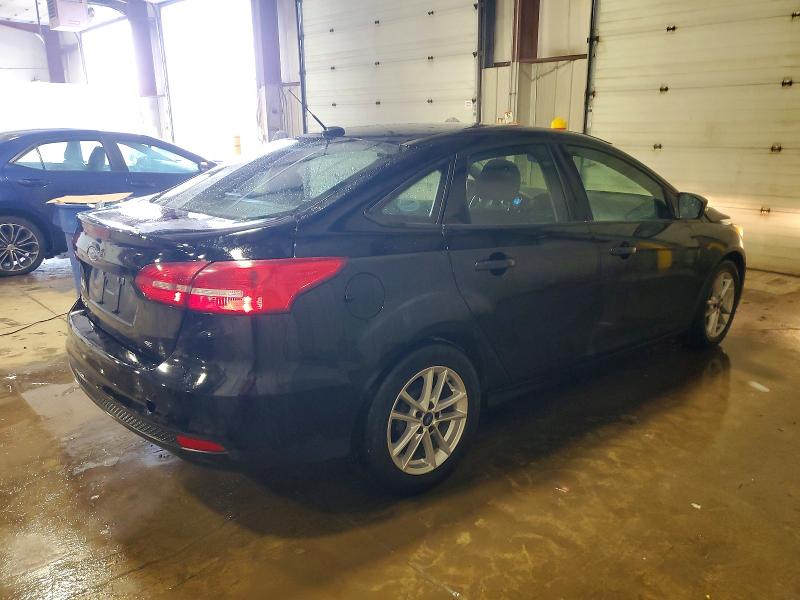 Photo 3 from auction – 2016 FORD FOCUS SE with VIN 1FADP3F26GL351856