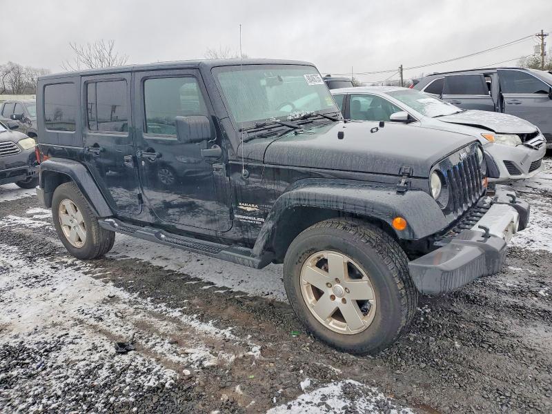 Photo 4 from auction – 2010 JEEP WRANGLER U with VIN 1J4BA5H18AL156684