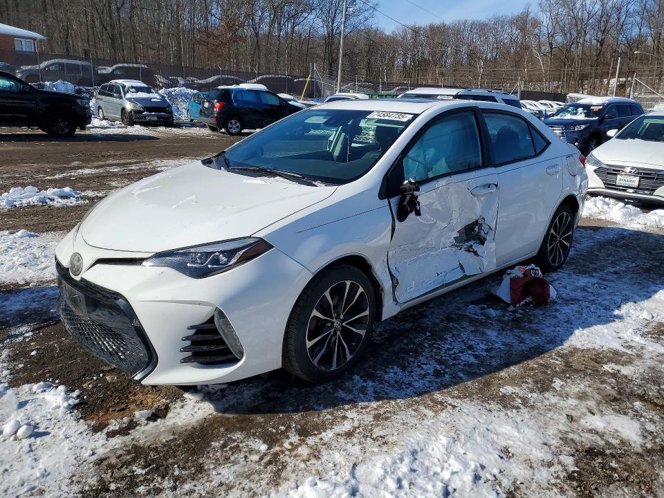 TOYOTA COROLLA 2017 with VIN 2T1BURHE1HC855440 - Photo from auction