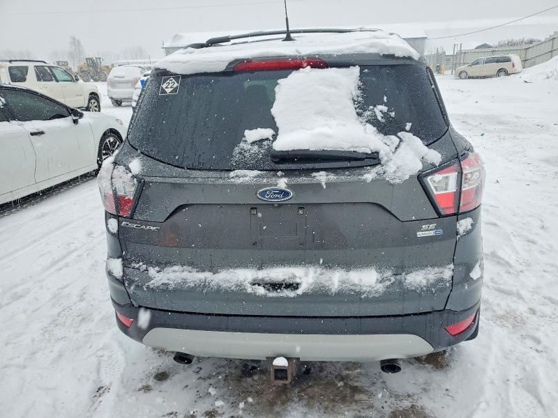 Photo 6 from auction – 2018 FORD ESCAPE SE with VIN 1FMCU9GD9JUC81929