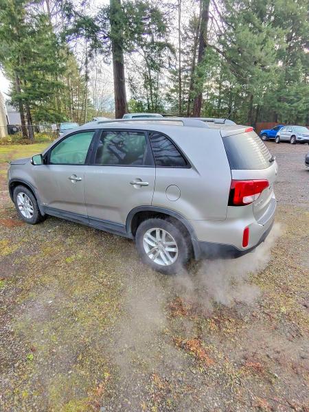 Photo 3 from auction – 2015 KIA SORENTO LX with VIN 5XYKTDA70FG583935