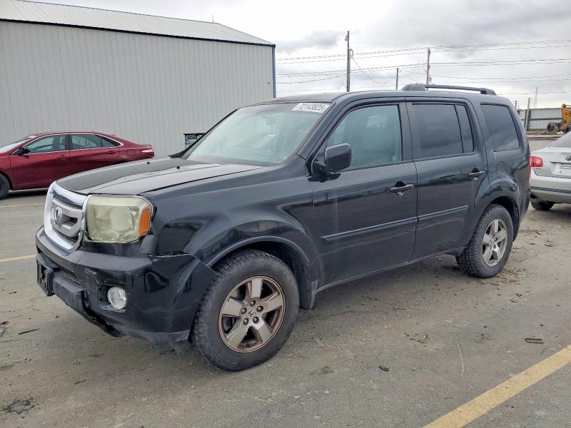 HONDA PILOT EX 2011 with VIN 5FNYF4H41BB034338 - Photo from auction