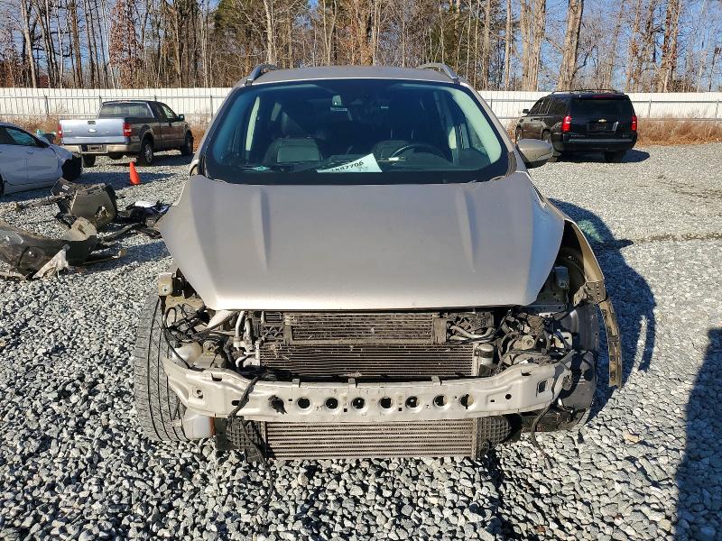 Photo 5 from auction – 2017 FORD ESCAPE TIT with VIN 1FMCU9J96HUC18589