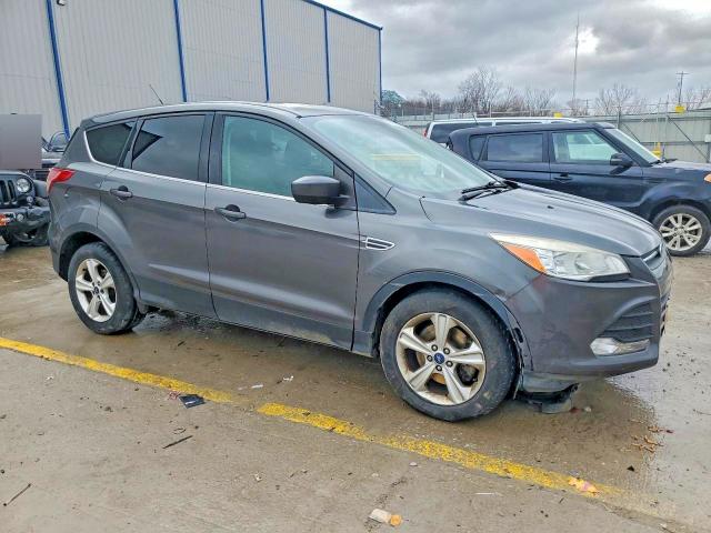 Photo 4 from auction – 2015 FORD ESCAPE SE with VIN 1FMCU9G92FUA80134