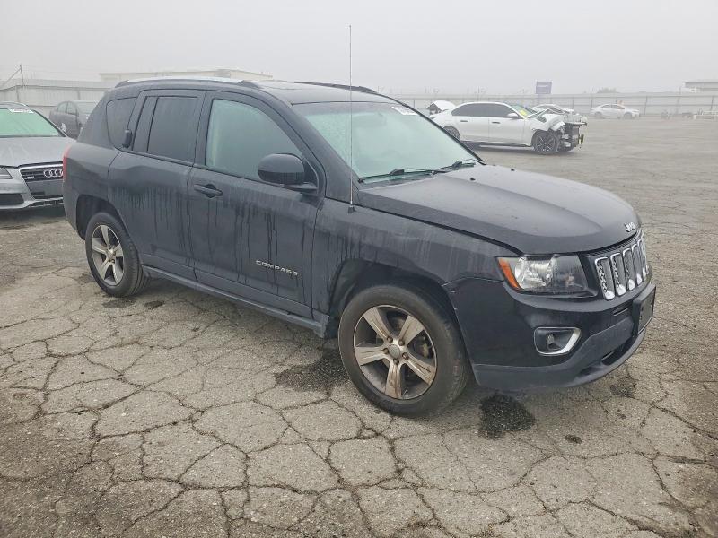 Photo 4 from auction – 2016 JEEP COMPASS LA with VIN 1C4NJCEA9GD677038