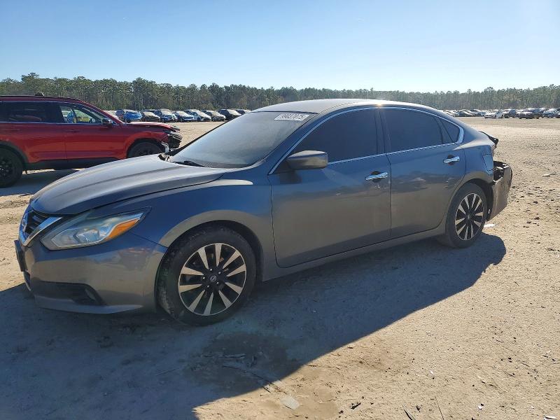 NISSAN ALTIMA 2018 with VIN 1N4AL3APXJC129281 - Photo from auction