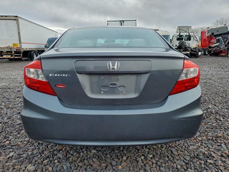 Photo 6 from auction – 2012 HONDA CIVIC LX with VIN 19XFB2F54CE075654