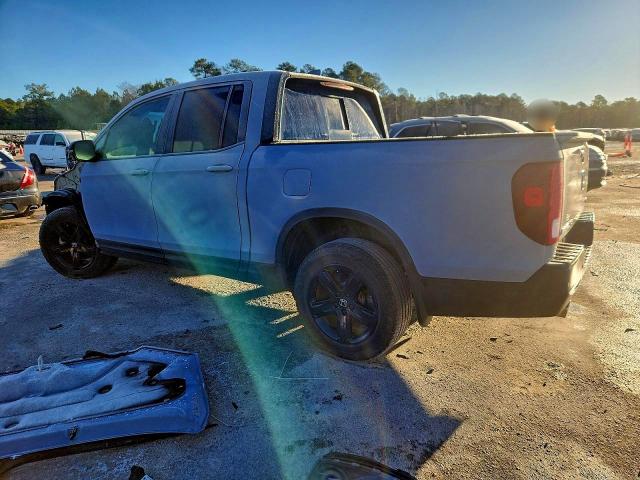 Photo 2 from auction – 2022 HONDA RIDGELINE with VIN 5FPYK3F89NB032697
