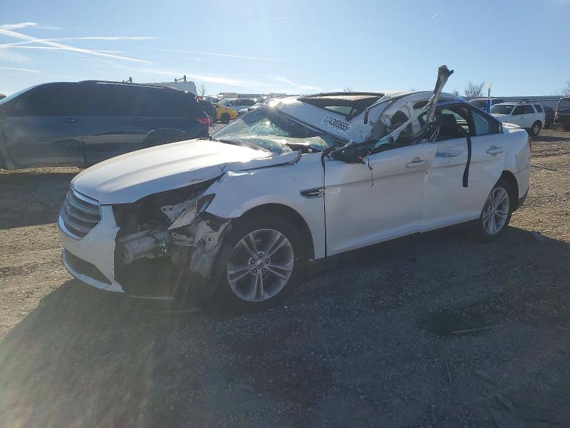 FORD TAURUS 2015 with VIN 1FAHP2E85FG195799 - Photo from auction