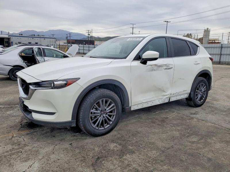 MAZDA CX-5 2020 with VIN JM3KFACM2L0861977 - Photo from auction