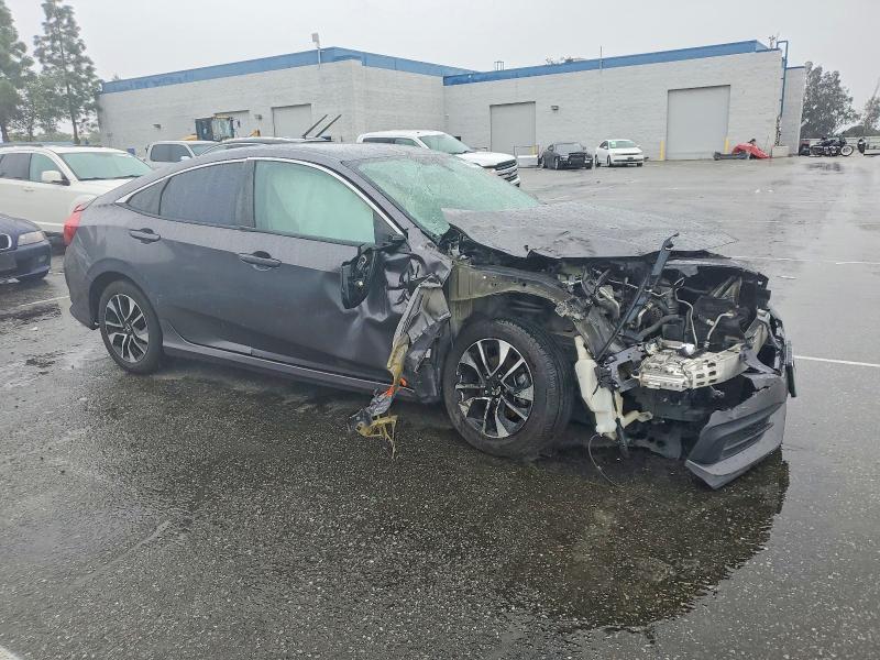 Photo 4 from auction – 2018 HONDA CIVIC with VIN 2HGFC2F55JH502291