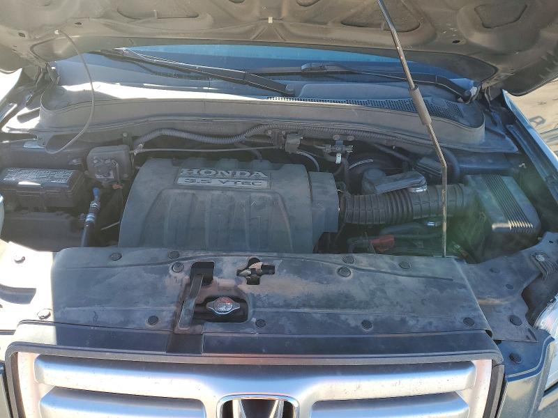Photo 12 from auction – 2006 HONDA PILOT EX with VIN 2HKYF18536H519286
