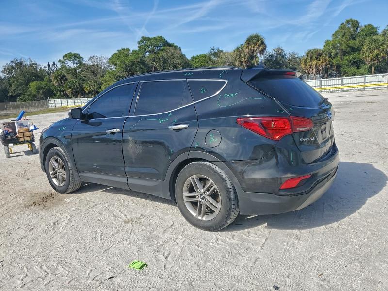 Photo 2 from auction – 2017 HYUNDAI SANTA FE S with VIN 5NMZU3LB9HH033911