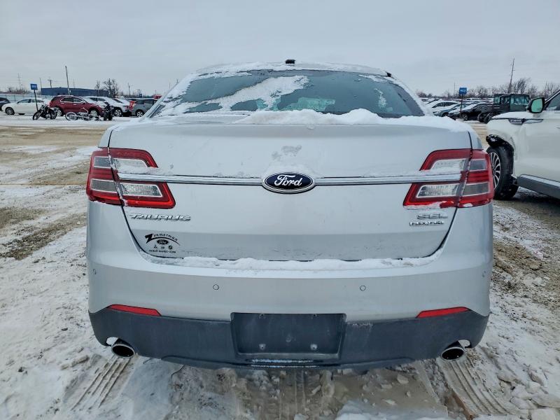 Photo 6 from auction – 2013 FORD TAURUS SEL with VIN 1FAHP2E80DG142909