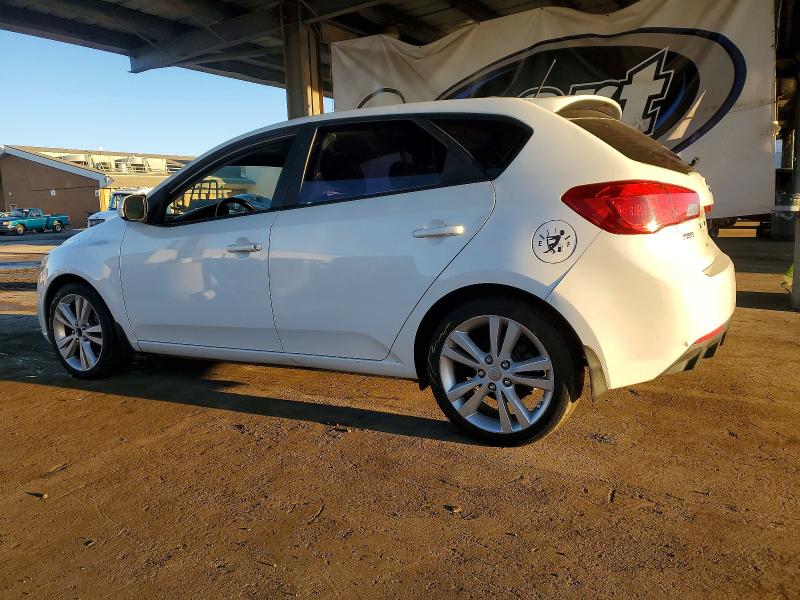 Photo 2 from auction – 2012 KIA FORTE with VIN KNAFW5A30C5572091