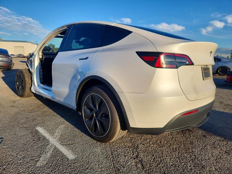 Photo 2 from auction – 2023 TESLA MODEL Y with VIN 7SAYGAEE5PF713130