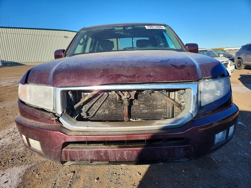 Photo 5 from auction – 2013 HONDA RIDGELINE with VIN 5FPYK1F56DB502841