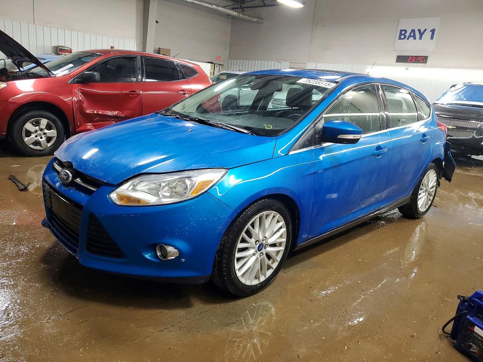 FORD FOCUS SEL 2012 with VIN 1FAHP3M22CL303950 - Photo from auction