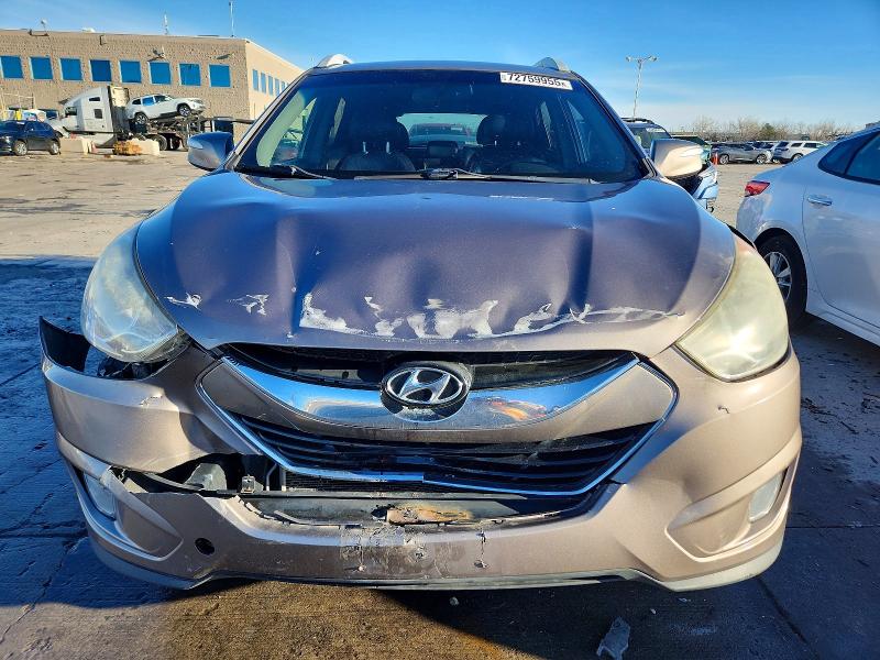 Photo 5 from auction – 2012 HYUNDAI TUCSON with VIN KM8JUCACXCU466109