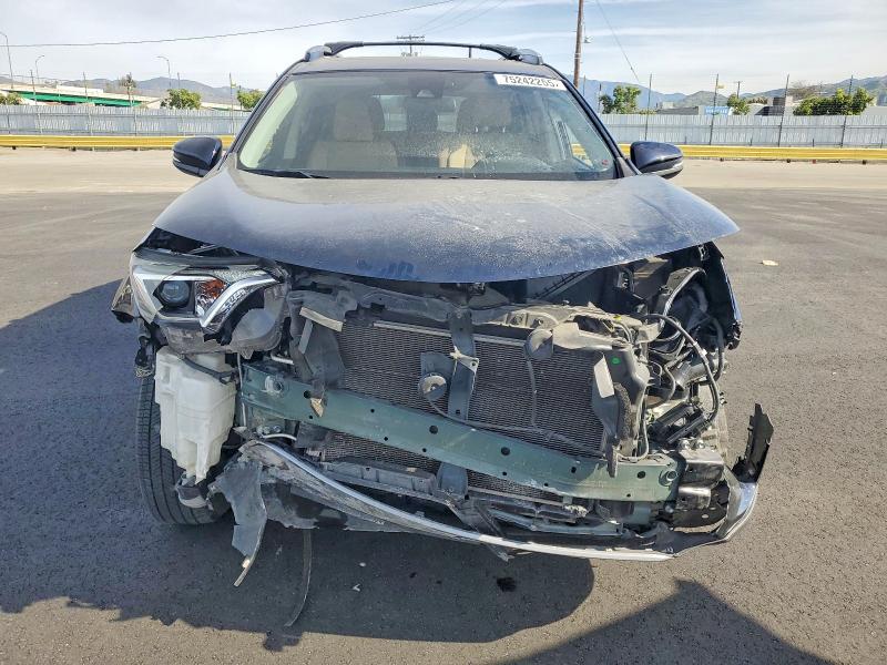 Photo 5 from auction – 2017 TOYOTA RAV4 with VIN JTMWFREV5HJ714620