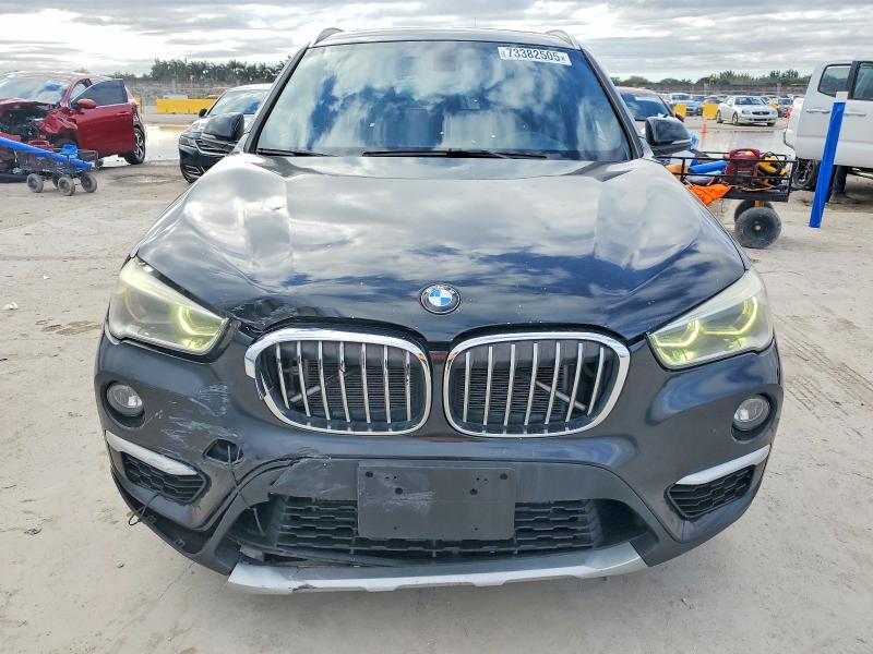 Photo 5 from auction – 2017 BMW X1 XDRIVE2 with VIN WBXHT3C31H5F74029