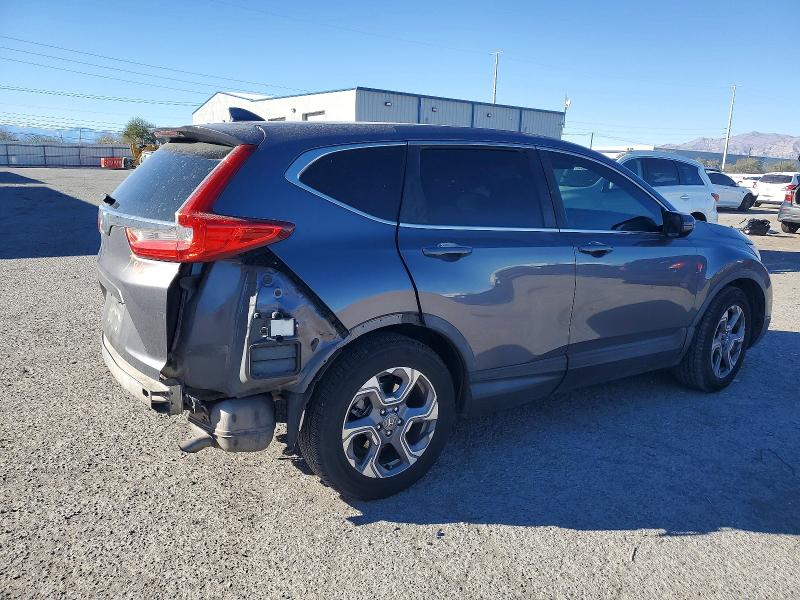 Photo 3 from auction – 2019 HONDA CR-V with VIN 7FARW1H59KE030263